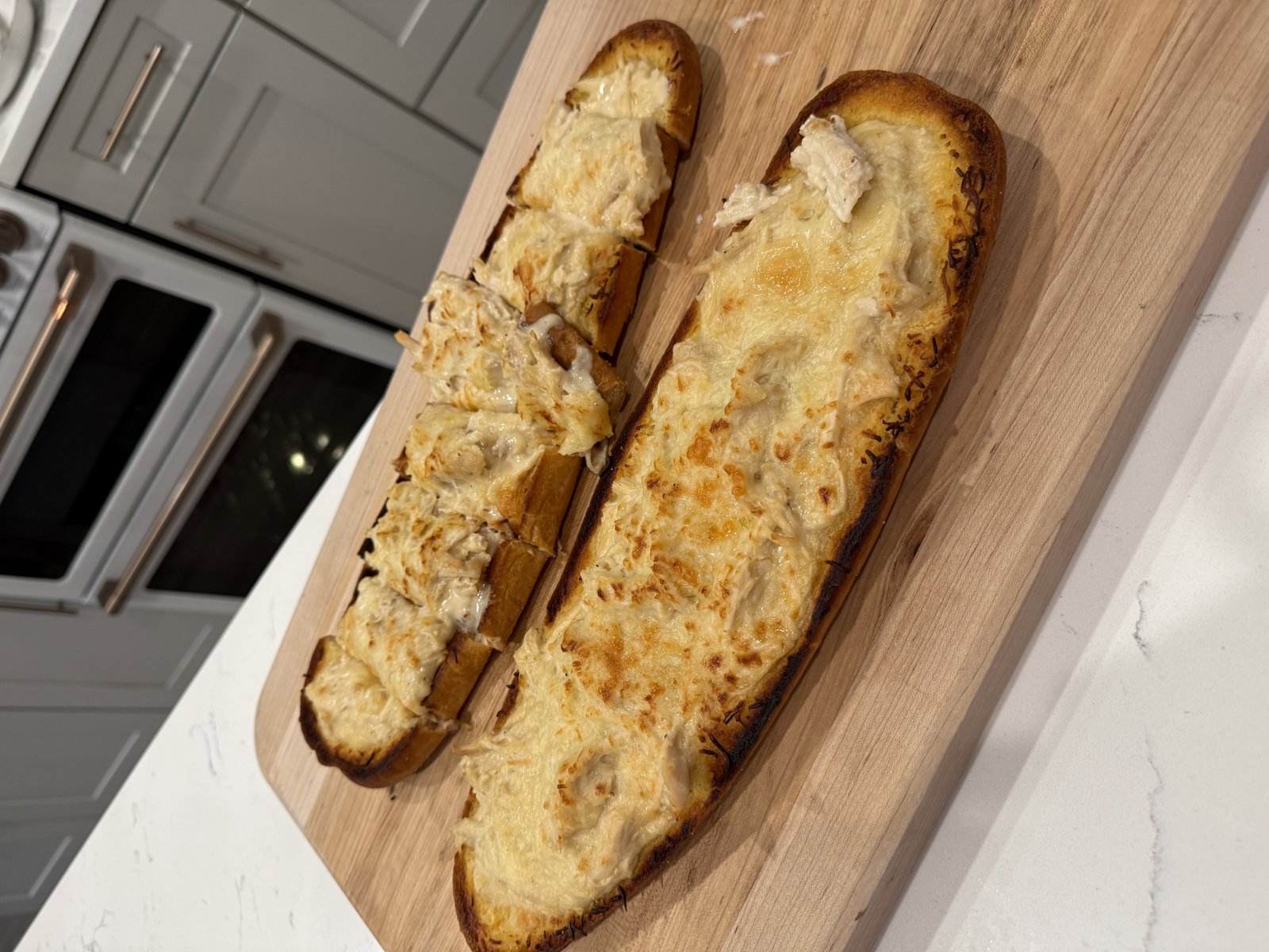 Crockpot Cajun Chicken Alfredo Garlic Bread